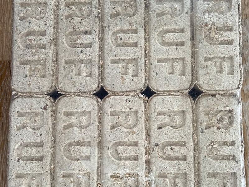 Wood briquettes, stacked